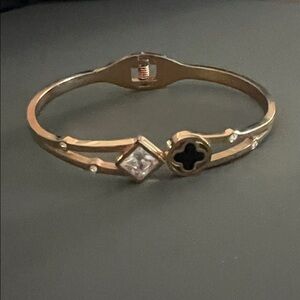 Gold tone Bracelet with Black and Clear Accents